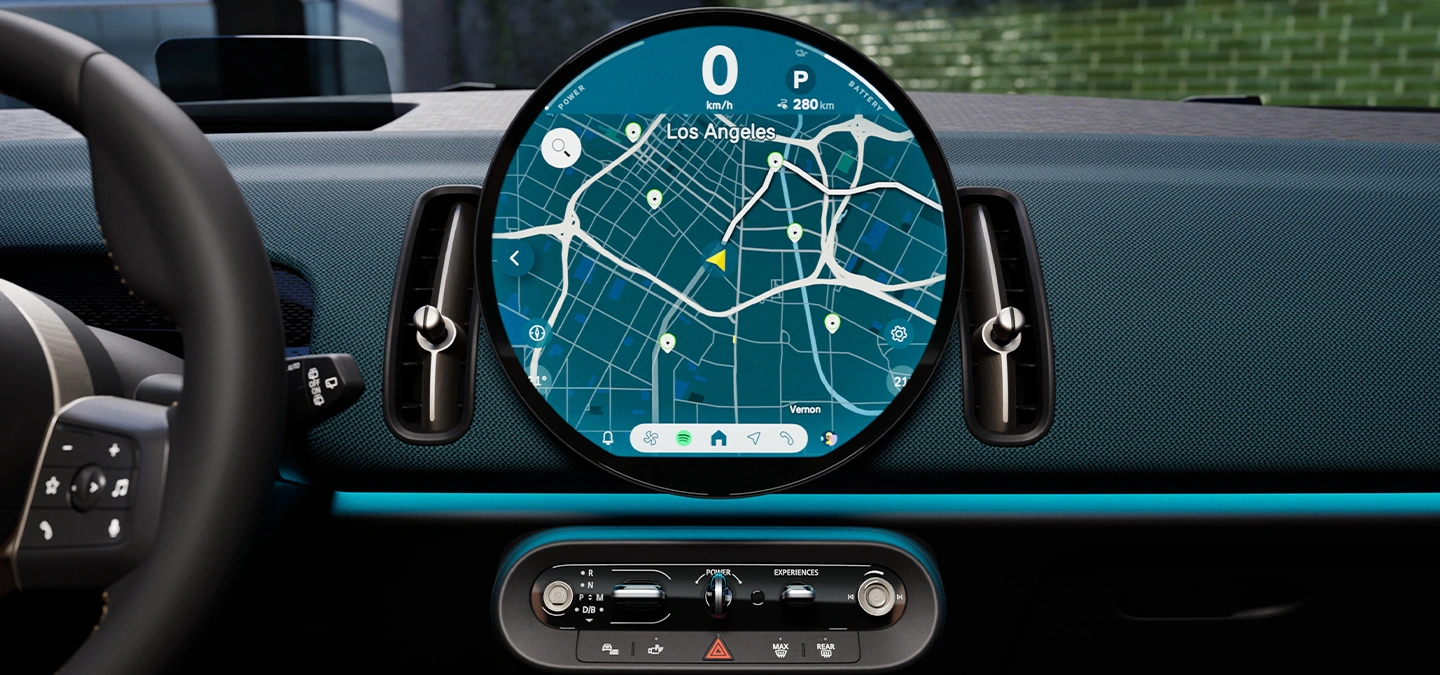 Detail view of the all-electric MINI Countryman interaction unit with focus on the navigation.