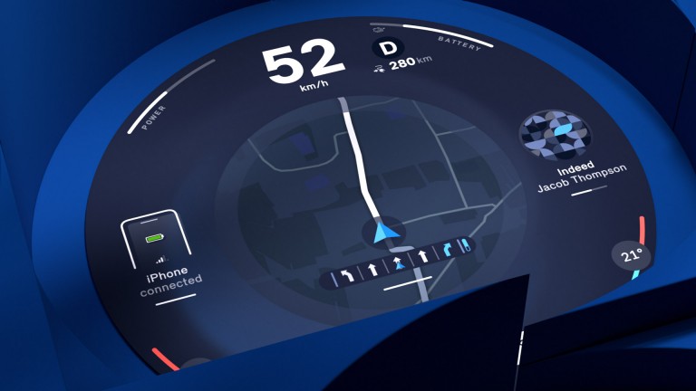  MINI round display showing the speed and navigation screen